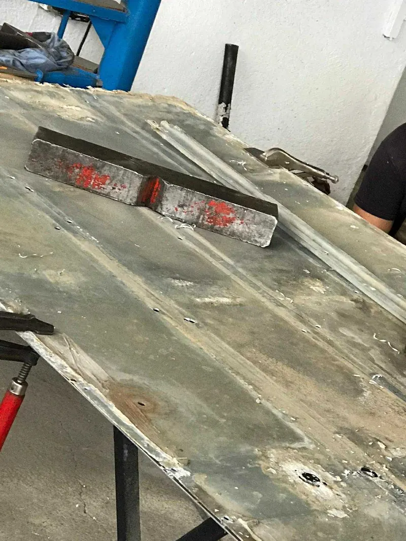Original floor panel with corrosion