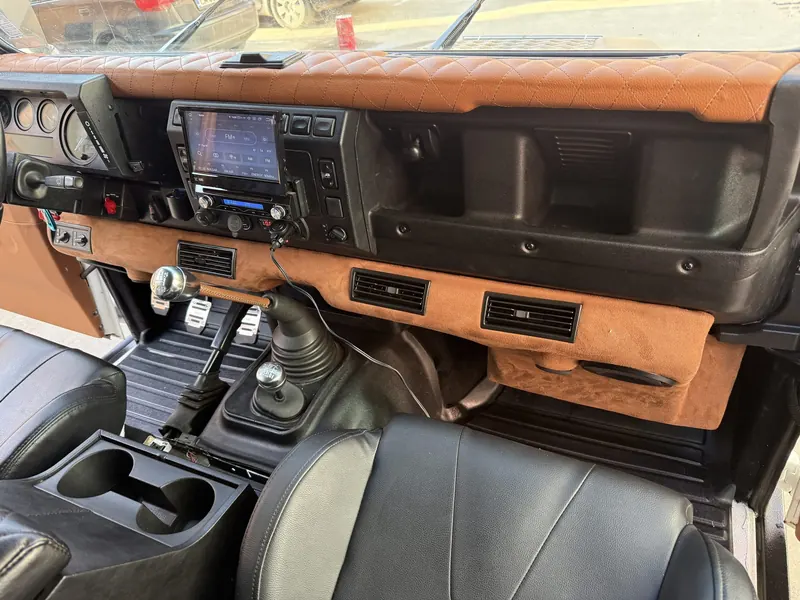 Rebuilt dashboard with leather trim, Android head unit and sport seats