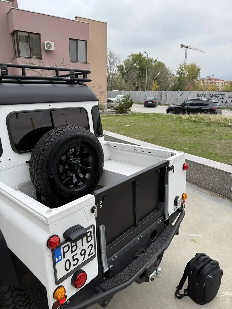 Load bed with the spare wheel