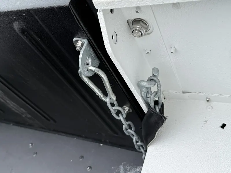 Tailgate chain and hinge detail