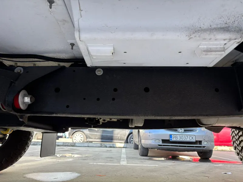 Black coated underside and rear crossmember